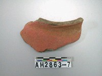 藏品(紅色夾砂素面陶片)的圖片